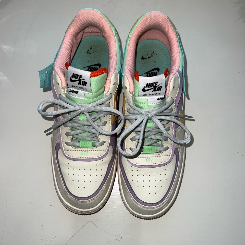 Nike White and Pink Athletic Shoes Low-Top Design